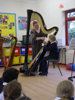 Hethersett Old Hall School- playing the harp
